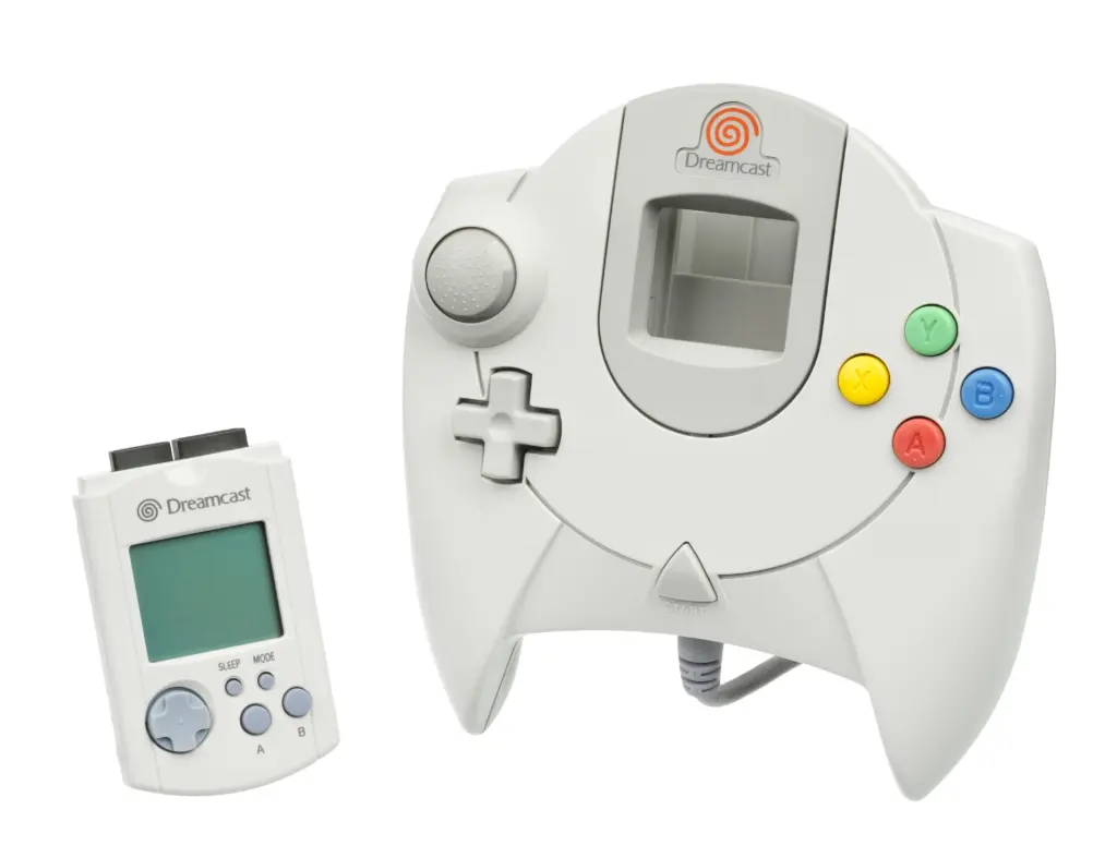 Sega Dreamcast console, controller and VMU accessories from the system’s short era.