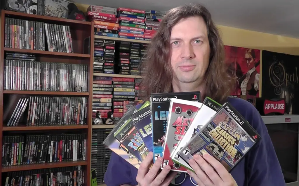 Metal Jesus Rocks posing with classic games and retro gaming event artwork.